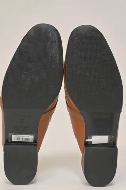 Cognac Heritage calfksin Oz slip-on mules with palladium-plated Kelly buckle