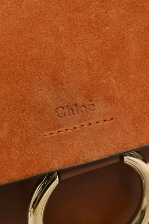 Cognac leather and suede Faye trapeze shoulder bag with adjustable strap