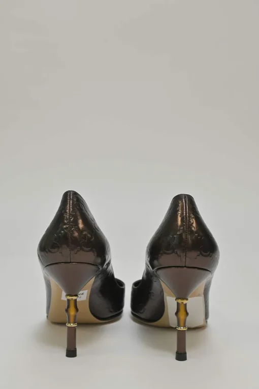 Copper GG Supreme monogram-embossed leather pointed-toe pumps with sculpted bamboo heel