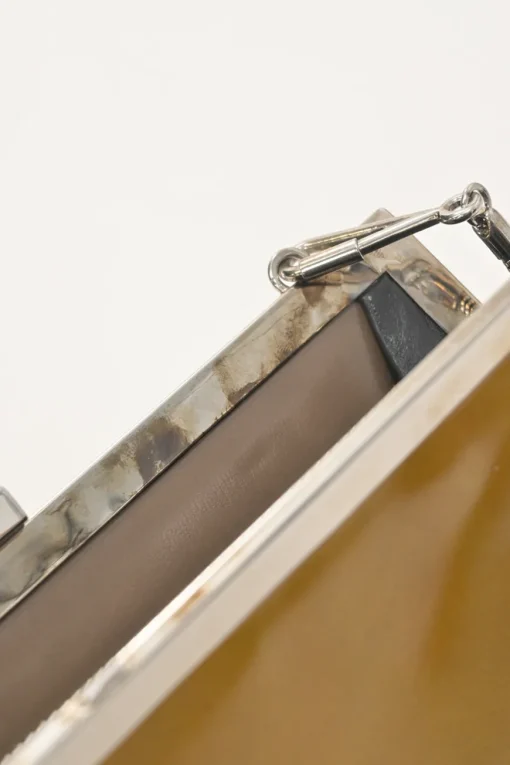 Copper patent leather crossbody kiss lock clutch with silver-tone metallic snake chain