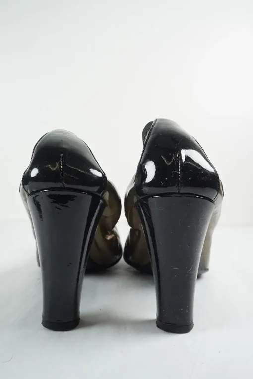 Copper round-toe Spirit block heel soft pumps with contrast cap toe and embroidered Coco Mark ankle