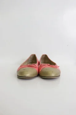 Coral pink and gold calfskin bow-embellished ballerinas with top-stitched Coco Mark cap toe