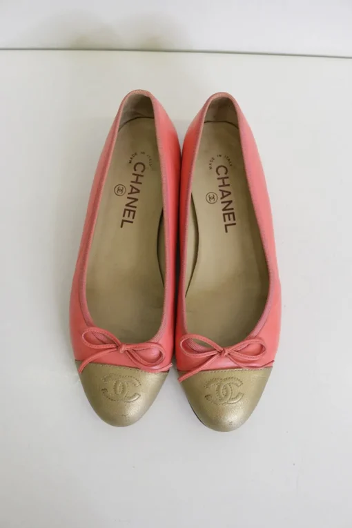 Coral pink and gold calfskin bow-embellished ballerinas with top-stitched Coco Mark cap toe
