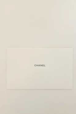 Cream and black matelassé lambskin Baguette Minaudière