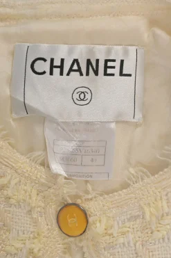 Cream cotton-blend gingham check bouclé tweed single breasted collarless cardigan jacket with Coco Mark resin shank button
