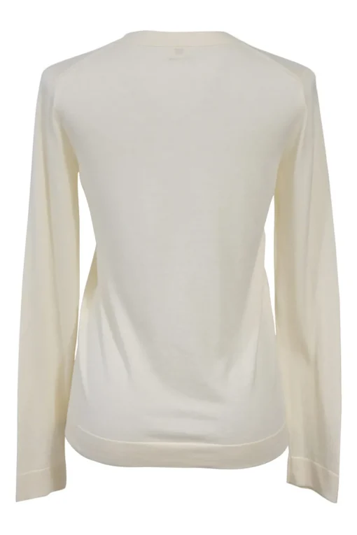 Cream cotton-silk interlock jersey knit V-neck long sleeve pullover top featuring pointelle H motif