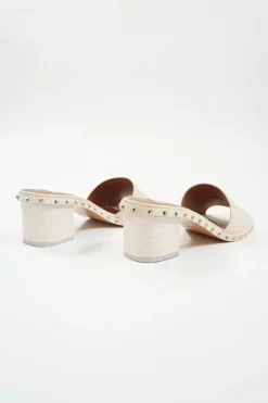 Cream embellished leather Rockstud block heel slide sandals