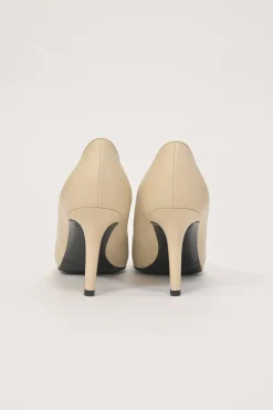 Cream leather and grosgrain round-toe camellia platform pumps with contrasting toe caps