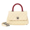 Cream matelassé caviar leather Coco Handle bag with ruthenium finish hardware and contrasting lizard skin trim appliqué