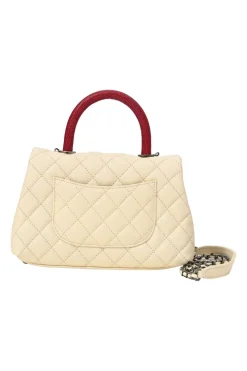 Cream matelassé caviar leather Coco Handle bag with ruthenium finish hardware and contrasting lizard skin trim appliqué