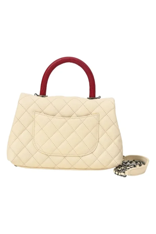 Cream matelassé caviar leather Coco Handle bag with ruthenium finish hardware and contrasting lizard skin trim appliqué