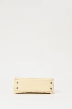 Cream matelassé caviar leather Coco Handle bag with ruthenium finish hardware and contrasting lizard skin trim appliqué