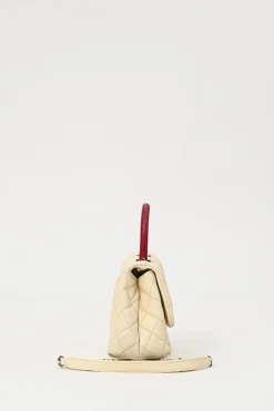 Cream matelassé caviar leather Coco Handle bag with ruthenium finish hardware and contrasting lizard skin trim appliqué