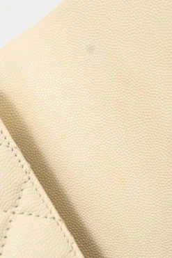 Cream matelassé caviar leather Coco Handle bag with ruthenium finish hardware and contrasting lizard skin trim appliqué