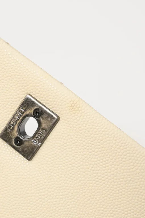 Cream matelassé caviar leather Coco Handle bag with ruthenium finish hardware and contrasting lizard skin trim appliqué