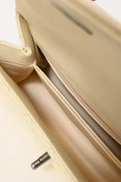 Cream matelassé caviar leather Coco Handle bag with ruthenium finish hardware and contrasting lizard skin trim appliqué