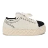 Cream matelassé terrycloth low-top platform sneakers with contrasting cap toe