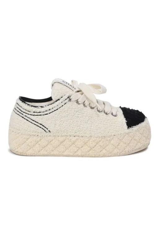 Cream matelassé terrycloth low-top platform sneakers with contrasting cap toe