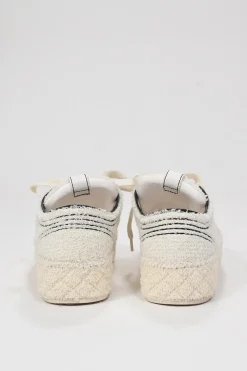 Cream matelassé terrycloth low-top platform sneakers with contrasting cap toe