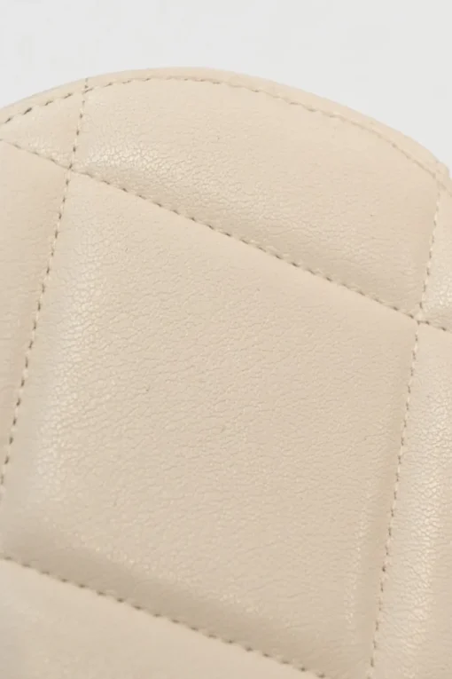 Cream quilted goatskin 19 round clutch with chain with mixed-metal hardware
