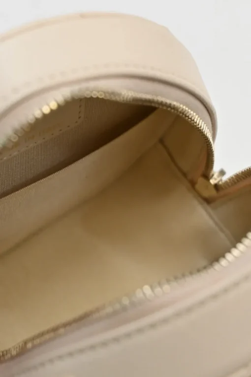 Cream quilted goatskin 19 round clutch with chain with mixed-metal hardware