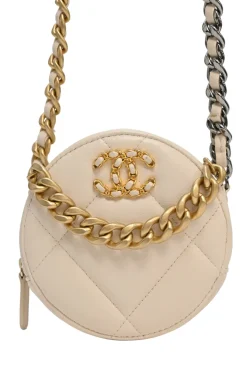 Cream quilted goatskin 19 round clutch with chain with mixed-metal hardware