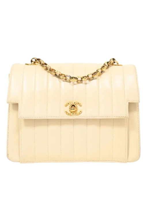 Cream vertical quilted lambskin leather Mademoiselle flap bag with gold-plated hardware