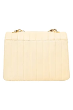 Cream vertical quilted lambskin leather Mademoiselle flap bag with gold-plated hardware