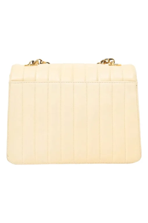 Cream vertical quilted lambskin leather Mademoiselle flap bag with gold-plated hardware