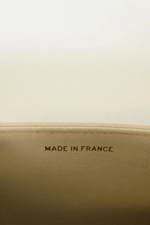 Cream vertical quilted lambskin leather Mademoiselle flap bag with gold-plated hardware