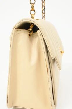 Cream vertical quilted lambskin leather Mademoiselle flap bag with gold-plated hardware
