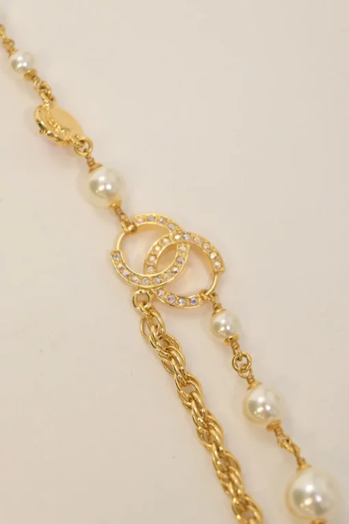 Crystal and resin faux pearl-embellished multi-strand gold-finish metallic chain rope necklace with scallop shell Coco Mark pendant
