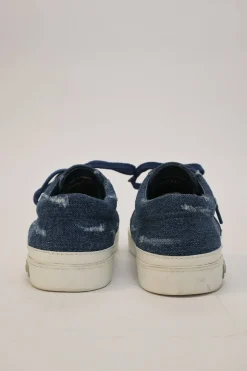 Crystal-embellished distressed indigo denim and rubber low-top sneakers