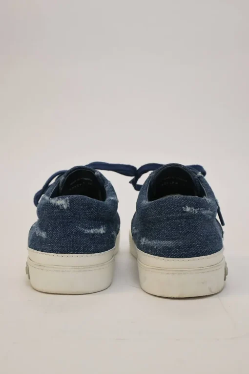 Crystal-embellished distressed indigo denim and rubber low-top sneakers