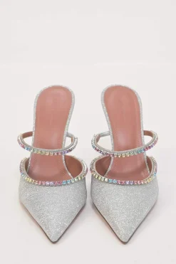 Crystal-embellished silver-tone metallic Gilda 105 pointed-toe mules with fixed mid-arch vamp strap and signature comma heels