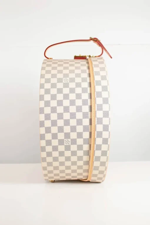 Damier Azur canvas Boite Chapeaux Hat Box 40 with natural cowhide leather, adjustable top handle and polished brass hardware.