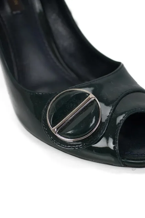 Dark green patent leather peep-toe sling-back high-heel pump with round metal embellishments