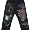 Dark indigo cotton denim straight-leg boro jeans featuring mixed-media patch appliqué