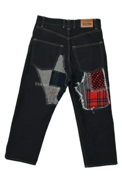 Dark indigo cotton denim straight-leg boro jeans featuring mixed-media patch appliqué