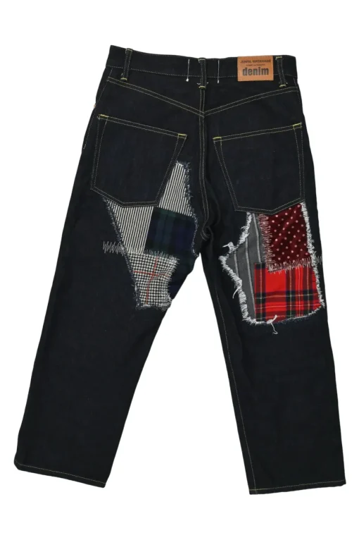 Dark indigo cotton denim straight-leg boro jeans featuring mixed-media patch appliqué