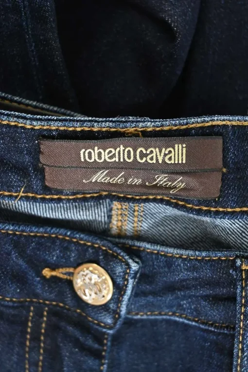 Dark indigo cotton-blend denim low-rise skinny jeans