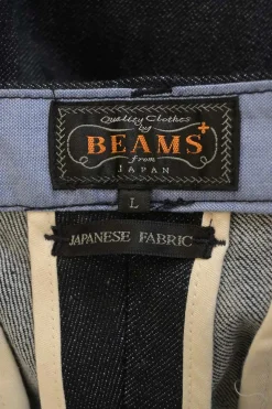 Dark indigo cotton-blend denim pull-on straight-leg pants with Martingale, waist adjusters and extended tab closure