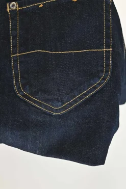 Dark indigo cotton-blend denim pull-on low-rise skinny Billy jeans with logo broderie motif along side seam
