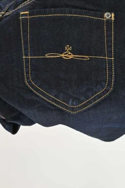 Dark indigo cotton-blend denim pull-on low-rise skinny Billy jeans with logo broderie motif along side seam