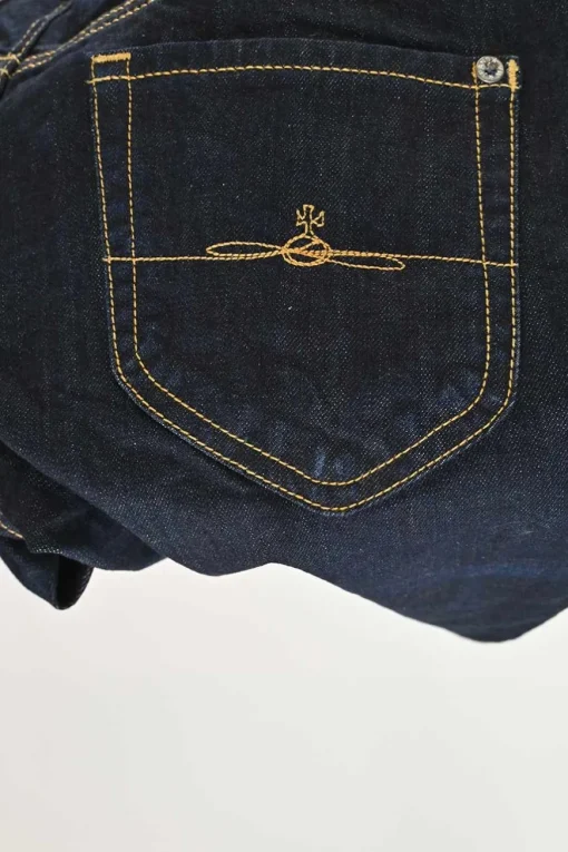 Dark indigo cotton-blend denim pull-on low-rise skinny Billy jeans with logo broderie motif along side seam