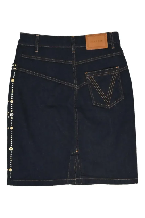Dark indigo embellished cotton-blend denim Medusa rivet and shank button pencil skirt
