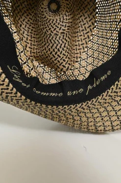 Ecru and black woven raffia Etna straw hat with "Leger comme une plume" embroidered band