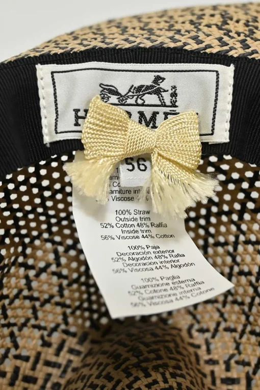 Ecru and black woven raffia Etna straw hat with "Leger comme une plume" embroidered band