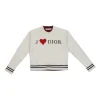 Ecru and red cashmere-blend Dioramour fully-fashioned jacquard knit crewneck pullover sweater