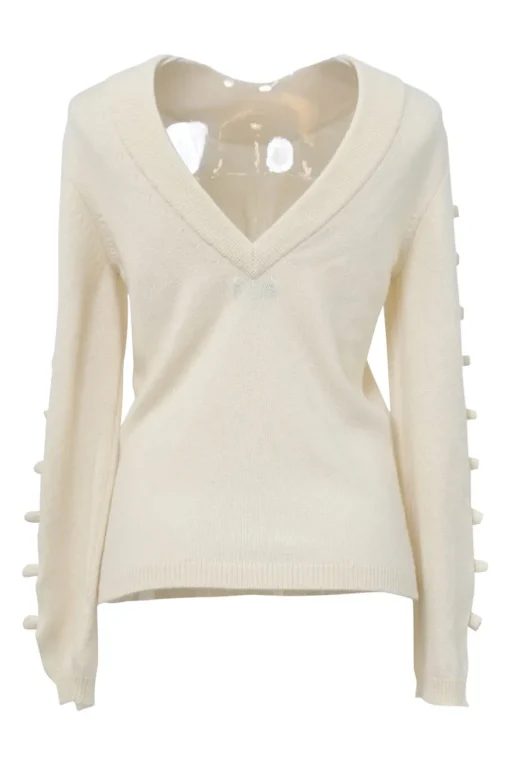 Ecru cashmere portrait neck pullover sweater featuring cutout sleeves with camellia appliqué